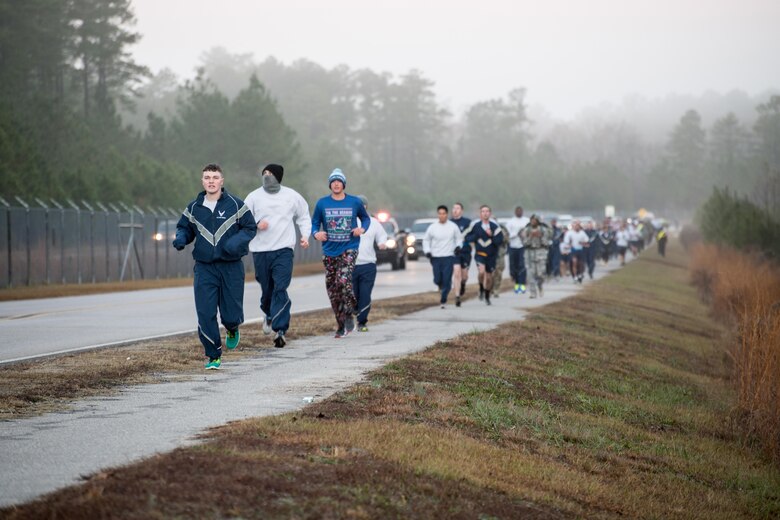 POPE ARMY AIRFIELD, N.C. — More than 130 Airmen participated in the 43d Air Mobility Operations Group Toy Trot on a chilly morning here Dec. 7. Toy Trot is a run and toy donation event held annually in conjunction with the Army’s Operation Toy Drop here, and organizers for both events donate collected toys to local communities. For more photos from this event, visit the 43d AMOG Flickr page at www.flickr.com/43AMOG. (U.S. Air Force photo/Marc Barnes)