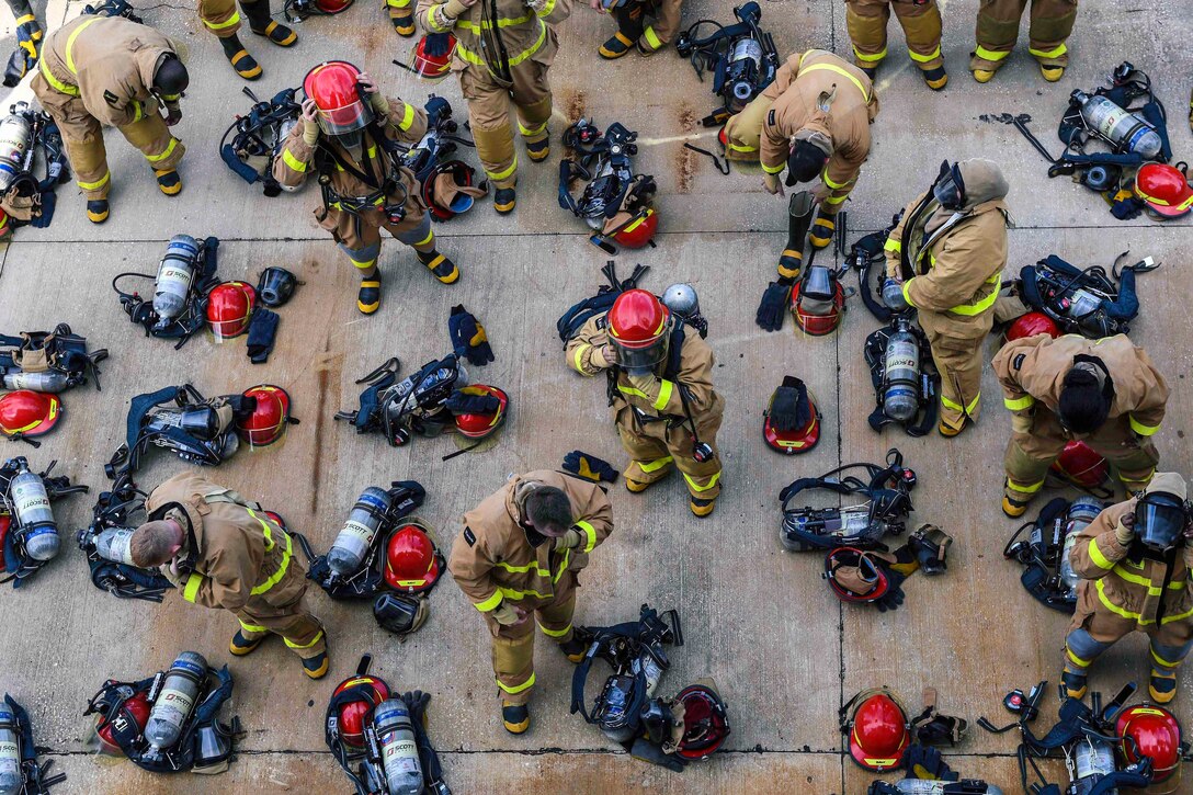 Sailors train at the Firefighting Training Facility at Naval Station Mayport, Fla., Dec. 7, 2016. At the facility, sailors attached to ships and components learn hose handling, communication procedures and the responsibilities of each member of a hose team. Navy photo by Petty Officer 3rd Class Michael Lopez