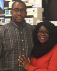 My husband and I pose for a photo at the Base Exchange Nov. 29, 2016 at Malmstrom Air Force Base, Mont. Recently my husband and I attended a Relationship Enrichment Seminar offered by the base chapel to teach us ways to communicate with each other as a married couple. (U.S. Air Force courtesy photo)