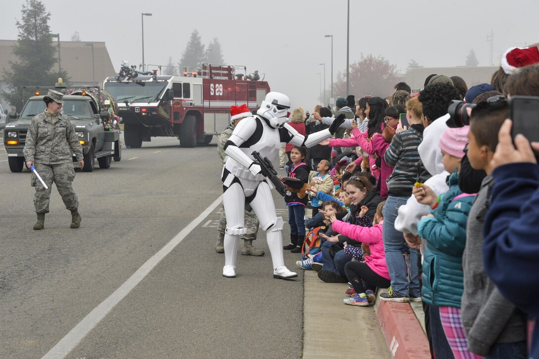 The 144th Fighter Wing hosts the 30th annual Silent Sleigh for members of the deaf community in Fresno, Calif., Dec. 7, 2016. The event, which includes several school districts, allows children who are deaf or hard of hearing a chance to sign with Santa and Mrs. Claus. Air National Guard photo by Air Force Tech. Sgt. Charles Vaughn