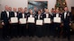 Graduates of the U.S. Air Force Advanced Maintenance and Munitions Operations School’s first Advanced Sortie Production Course pose for a photo during their graduation ceremony at Nellis Air Force Base, Nev., Dec. 7, 2016. The 12-week ASPC course -- which targets maintenance, munitions and logistics readiness officers in their four to nine year time-in-service window -- teaches its students to think and view problems differently, ultimately to help them solve sortie production deficiencies more effectively.