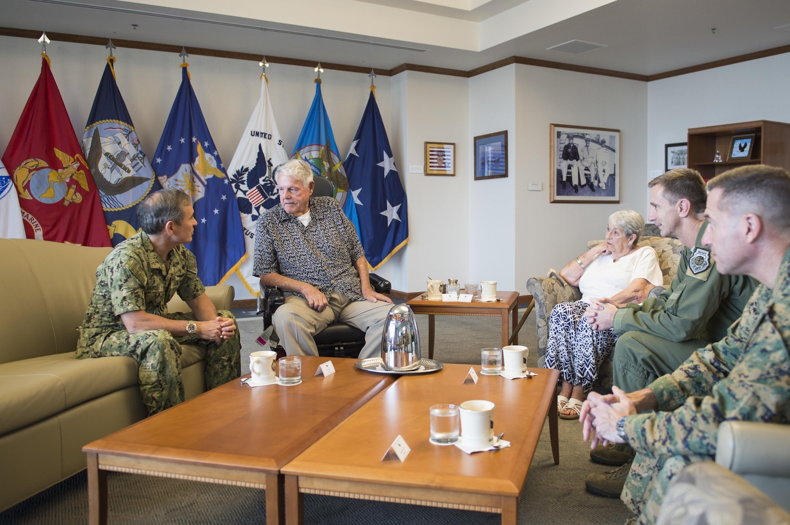 161208-N-DX698-036 CAMP H.M. SMITH, Hawaii (Dec. 8, 2016) Commander, U.S. Pacific Command, Adm. Harry Harris welcomes the WWII and former POW veteran, Sgt. George Emerson and his wife during their visit to the PACOM headquarters. Emerson was invited on behalf of Harris after he was unable to attend the official 75th Anniversary Commemoration on Dec. 7th in Pearl Harbor. Emerson served in the U.S. Army Air Corps and was captured by German forces when his plane was destroyed during an attack. (U.S. Navy photo by Petty Officer 1st Class Jay M. Chu/Released)