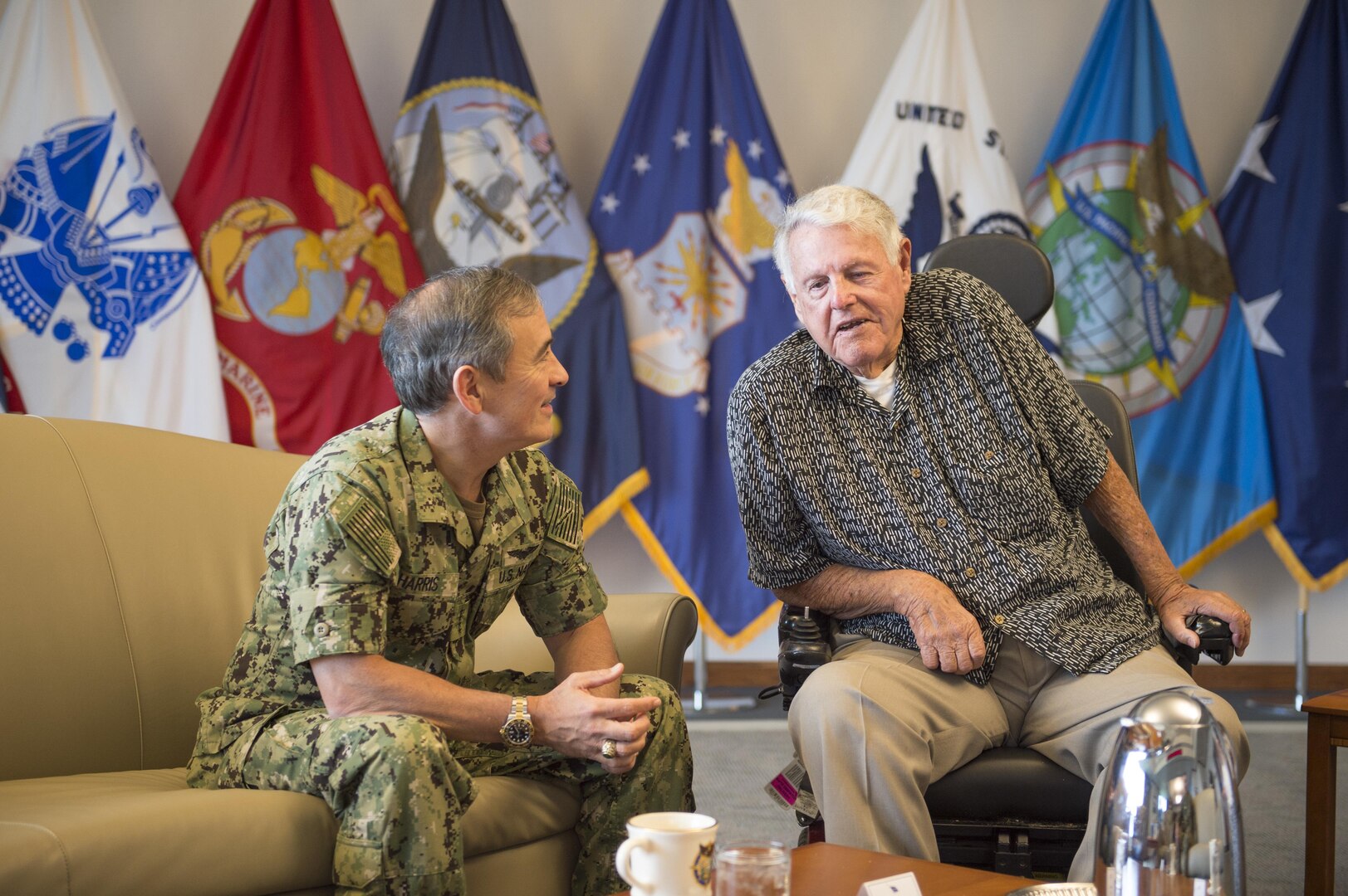161208-N-DX698-033 CAMP H.M. SMITH, Hawaii (Dec. 8, 2016) Commander, U.S. Pacific Command, Adm. Harry Harris welcomes the WWII and former POW veteran, Sgt. George Emerson and his wife during their visit to the PACOM headquarters. Emerson was invited on behalf of Harris after he was unable to attend the official 75th Anniversary Commemoration on Dec. 7th in Pearl Harbor. Emerson served in the U.S. Army Air Corps and was captured by German forces when his plane was destroyed during an attack. (U.S. Navy photo by Petty Officer 1st Class Jay M. Chu/Released)