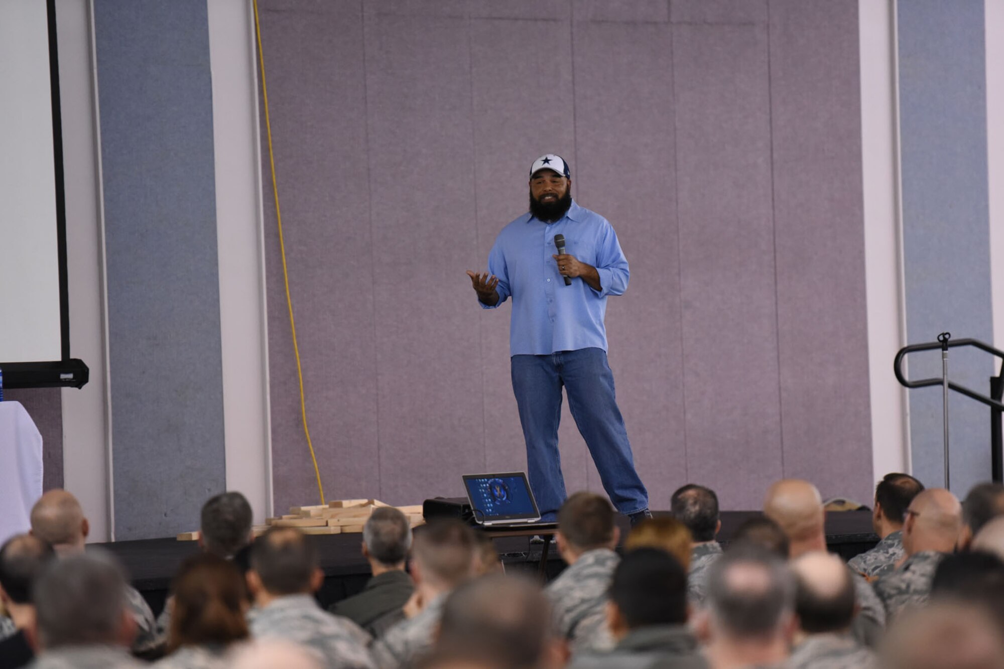 Ottis West, lead resiliency instructor for Techwerks, LLC, speaks to Airmen from the 120th Airlift Wing at the unit’s annual Wingman Day, December 3, 2016 at the Mansfield Center in Great Falls, Mont. West’s humorous anecdotes and personal stories entertained Airmen while educating them on resiliency. (U.S. Air National Guard photo/Master Sgt. Michael Touchette)