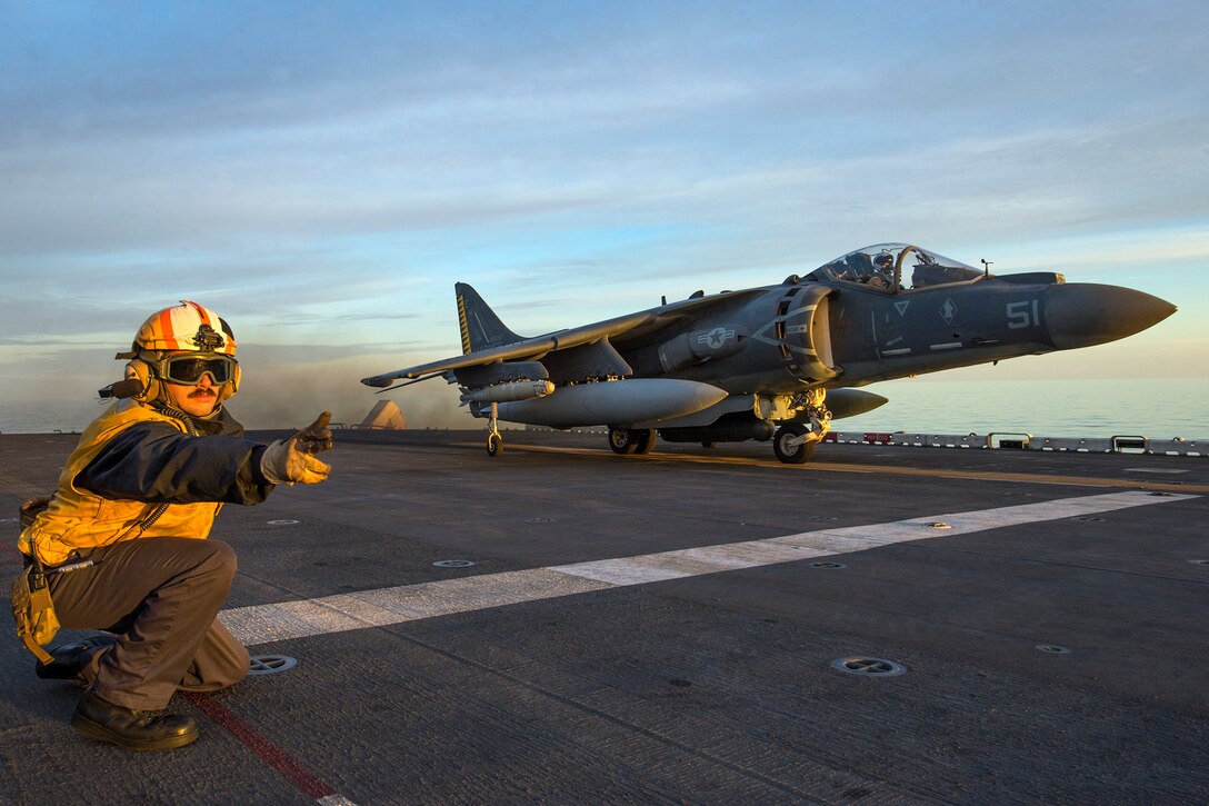 An AV-8B Harrier jet takes off from the amphibious assault ship USS Wasp in the Mediterranean Sea, Dec. 5, 2016. The 22nd Marine Expeditionary Unit is embarked on the Wasp, conducting precision air strikes in support of the Libyan Government aligned forces against Islamic State of Iraq and the Levant targets in Sirte, Libya as part of Operation Odyssey Lightning. Navy photo by Petty Officer 2nd Class Nathan Wilkes