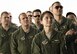 Members of the 36th Airlift Squadron listen to words given in remembrance of their colleague, the late Senior Airman Jeremy Jutba-Hake, 36th Airlift Squadron instructor loadmaster, at Andersen Air Force Base, Guam, Dec. 6, 2016. Jutba-Hake collapsed during post-flight duties following a training mission during Operation Christmas Drop 2015. Friends and family described Jutba-Hake as a kind person and a good leader who is missed by many. (U.S. Air Force photo by Senior Airman Elizabeth Baker/Released)