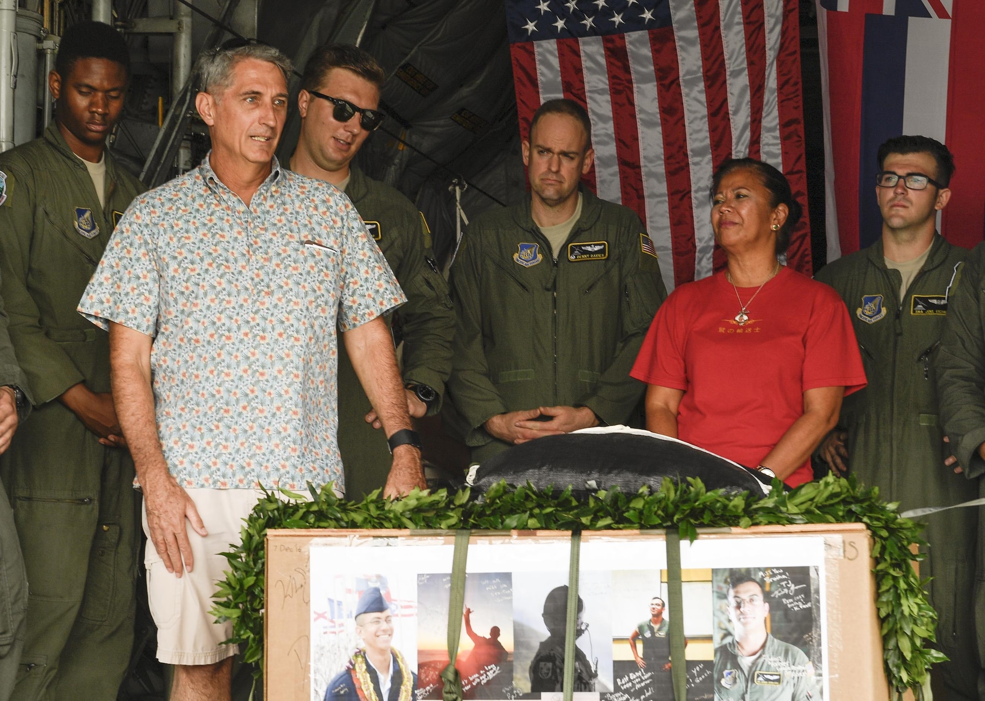 Chief Master Sgt. (Ret.) Jonathan Hake speaks at a remembrance ceremony for his son, Senior Airman Jeremy Jutba-Hake, 36th Airlift Squadron instructor loadmaster, at Andersen Air Force Base, Guam, Dec. 6, 2016. After Jutba-Hake passed of natural causes during Operation Christmas Drop 2015, his friends began a memorial foundation in his name called Santa 61. All donations to Santa 61 go to OCD to help continue Jutba-Hake’s legacy. (U.S. Air Force photo by Senior Airman Elizabeth Baker/Released)