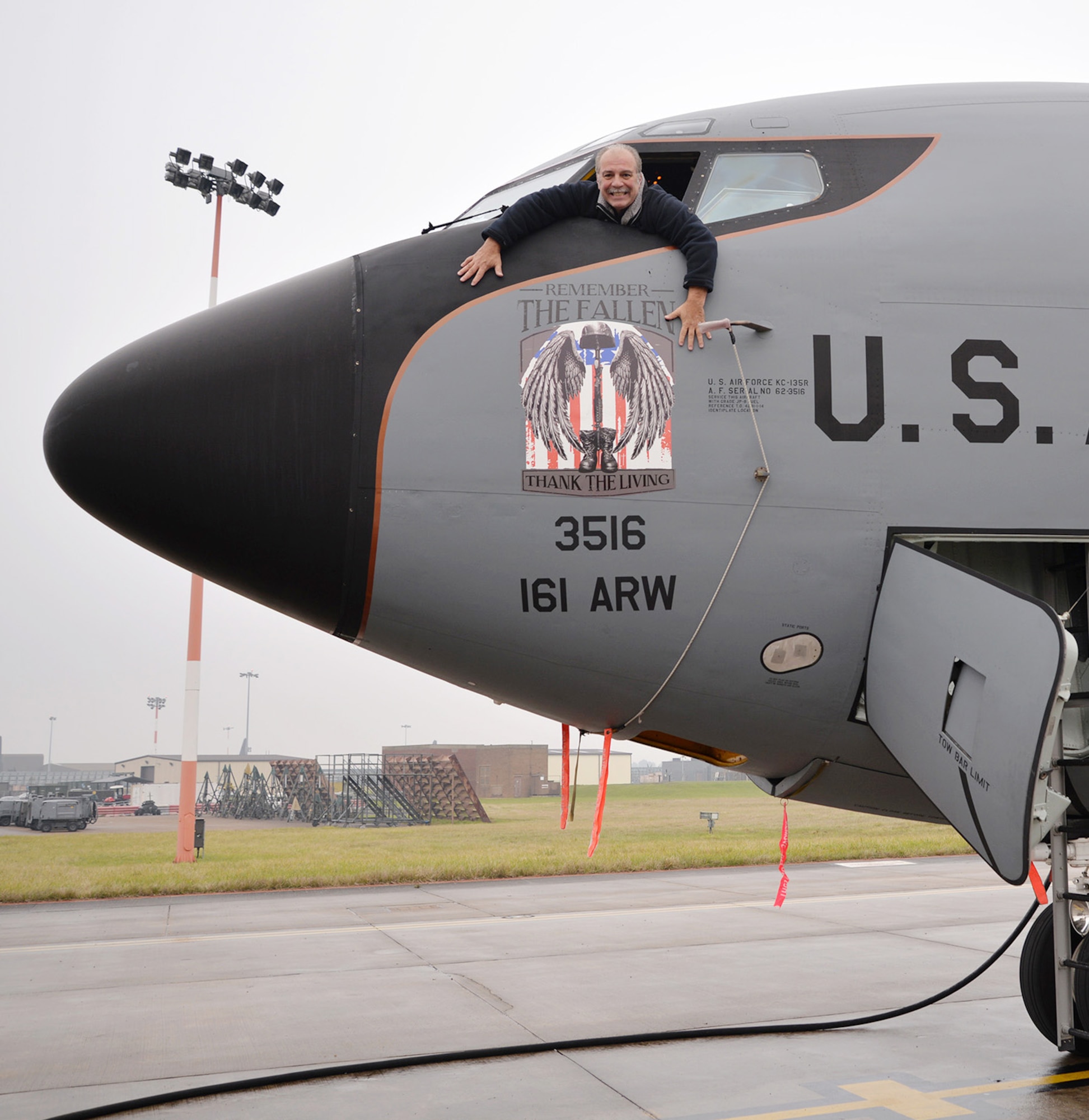 Dan Cinelli, 100th Maintenance Group functional systems administrator, poses for a photo in the cockpit of a KC-135 Stratotanker, tail number 62-3516, Dec. 6, 2017, on RAF Mildenhall, England. The aircraft, currently TDY here from Arizona, is the exact same one Cinelli posed in for a photo in 1993 when it was also TDY at RAF Mildenhall, when he was a then-staff-sergeant in the U.S. Air Force, working as a maintainer on the base’s fleet of aircraft. Aircraft 62-3516 was the first KC-135 he was assigned to during his military career as a crew chief, when stationed at Griffiss Air Force Base, Rome, New York. (U.S. Air Force photo by Karen Abeyasekere)