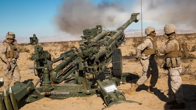 Marines with Battery K, 3rd Battalion, 11th Marine Regiment, fire an M777A2 Howitzer in the Acorn Training Area aboard the Marine Corps Air Ground Combat Center, Twentynine Palms, Calif., Dec. 2, 2016, during preparation for the regiment’s “Top Gun” competition. 