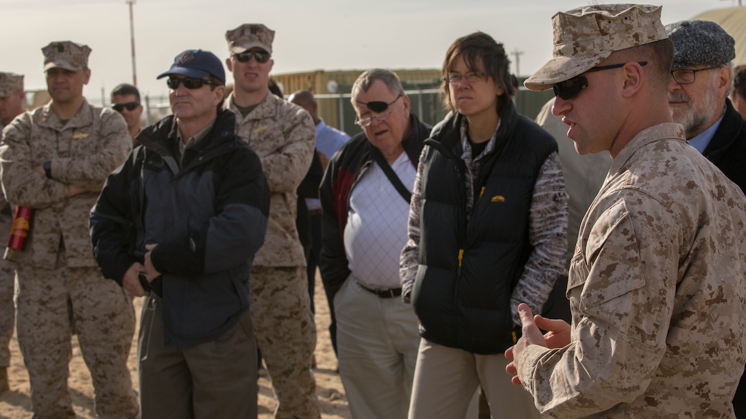 Capt. Michael Herendeen, science and technology analyst, Marine Corps Expeditionary Energy Office, explains different efforts and technologies the Marine Corps has developed during the Energy Capability Exercise, in alignment with the Great Green Fleet initiative, at Camp Wilson aboard the Marine Corps Air Ground Combat Center, Twentynine Palms, California, Dec. 6, 2016.