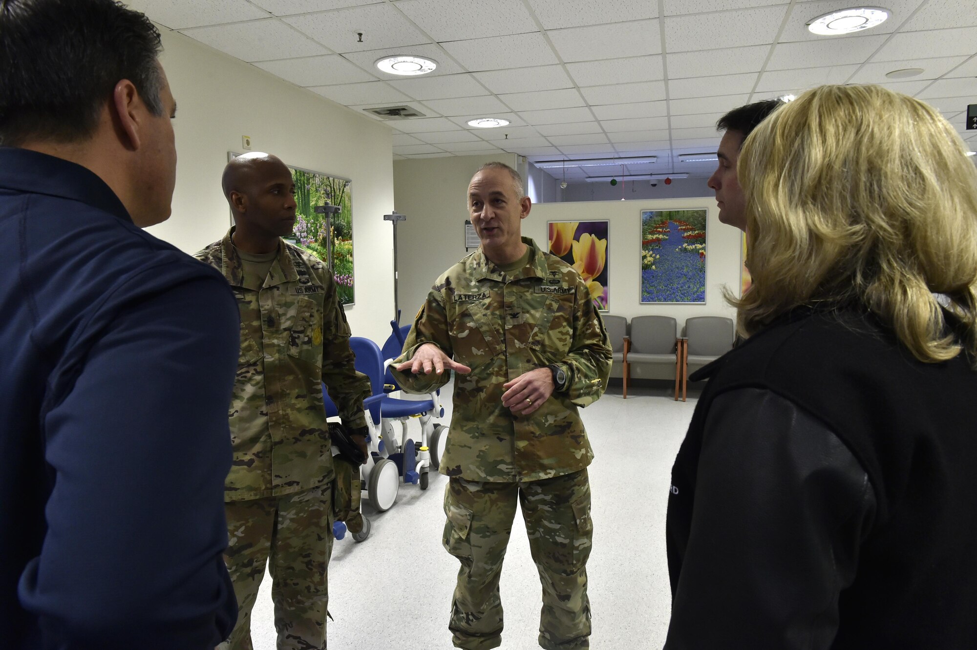 U.S. Army Col. James Laterza, Landstuhl Regional Medical Center commander, briefs the governors of Wisconsin, Oklahoma, and Nevada at LRMC, Germany, Dec. 9, 2016. The governors received a tour of the hospital while visiting Germany after spending time with their constituents in the U.S. Air Forces Central Command area of responsibility. (U.S. Air Force photo by Senior Airman Jonathan Bass)