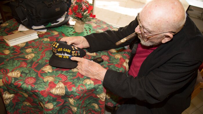 Irv Jennings, a 91-year-old resident of Veterans Home of California Barstow, explains the various medals, citations and awards he earned during the most destructive conflict in human history. He served aboard the destroyer USS Case, which supported the attack on the island of Iwo Jima. Jennings also helped build the airfield that launched the Enola Gay, the bomber that dropped the first and only atomic bomb used in modern warfare.