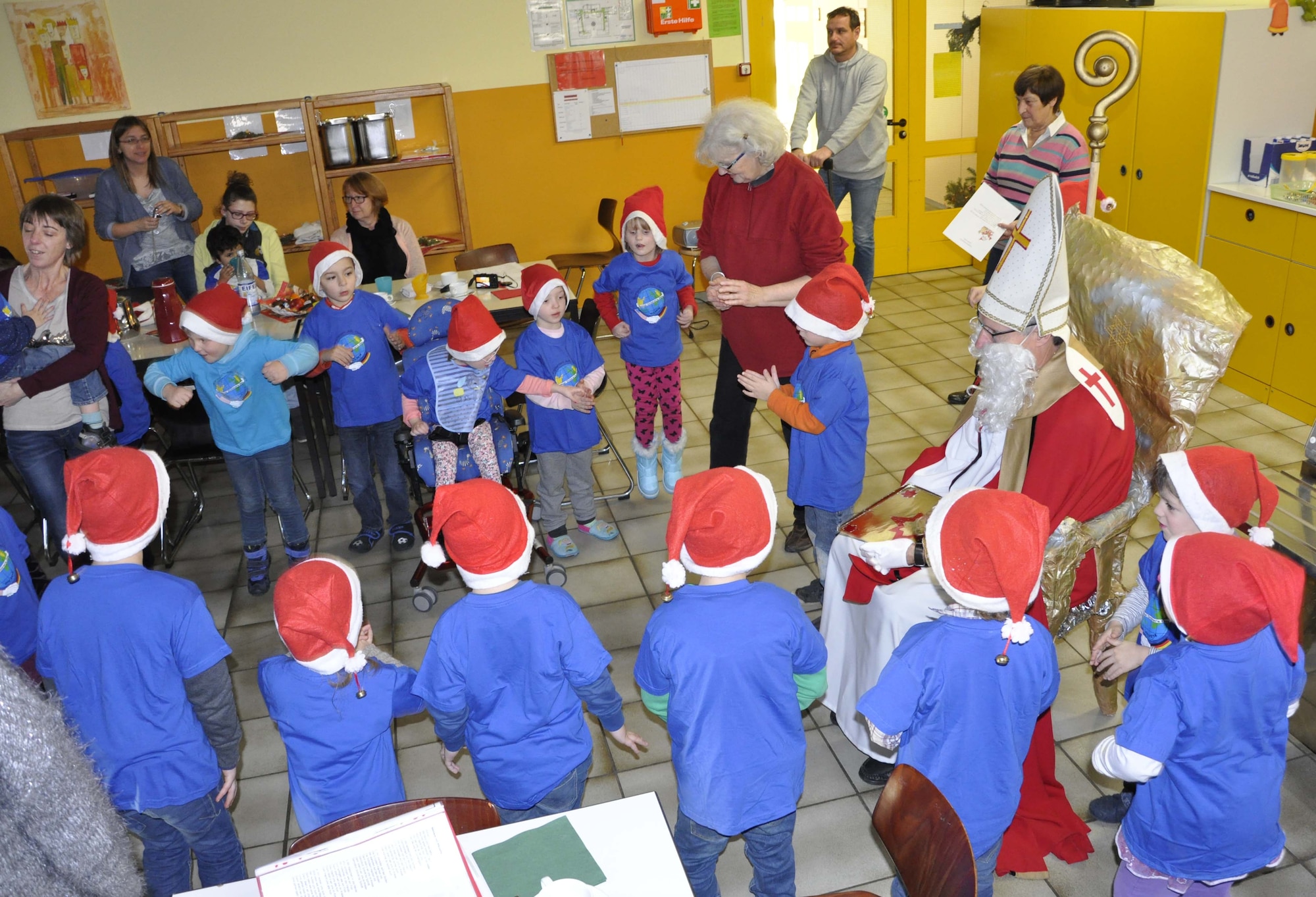 A group of Kindergarten children, belonging to the Bitburg Saint Martin school performed a dance during the school’s annual Saint Nicholas celebration, Dec. 5 in Bitburg. The event included a visit by Saint Nicholas, dances and singing performances by the children, as well as a gift presentation by the 52nd Fighter Wing. The celebration was attended by Saint Martin school officials, parents, 52nd Fighter Wing leadership spouses, as well as Airmen and civilians from the wing, who provided gifts to students and kindergarten children.  In the summer, Spangdahlem Sabers invited the Saint Martin school to Special Children’s Day at Spangdahlem AB, where they played games and spent a fun-filled time together. (U.S. Air Force photo by Iris Reiff)