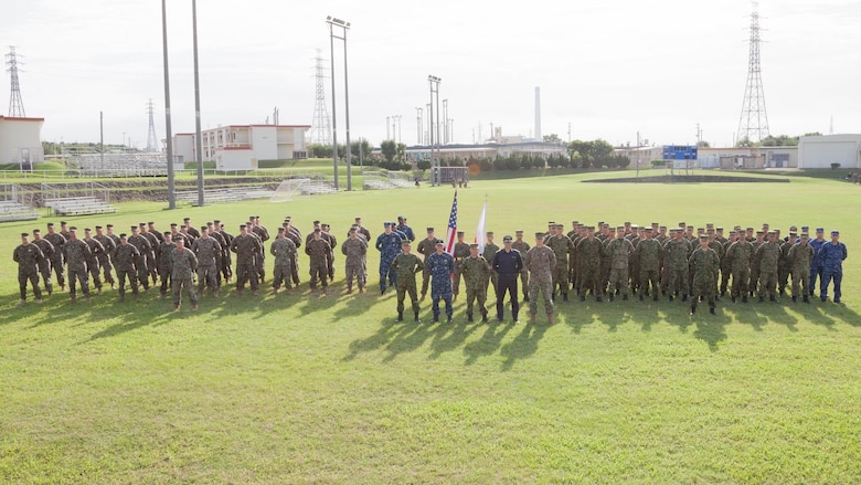 U.S. Marines with 3d Marine Expeditionary Brigade and service members of the Japan Ground Self-Defense Force conduct the opening ceremony for Yama Sakura 71 in Okinawa, Japan, Dec. 7, 2016. During this annual, bilateral exercise, members of the JGSDF and U.S. military exchange ideas, tactics, techniques, experiences, and culture. Specific Japanese units involved in YS 71 include the JGSDF Western Army, the Amphibious Ready Deployment Brigade and the Japan Maritime Self-Defense Force Mine Warfare Force. Other U.S. units include the Navy's 7th Fleet; Commander, Task Force 76; and CTF 79. 