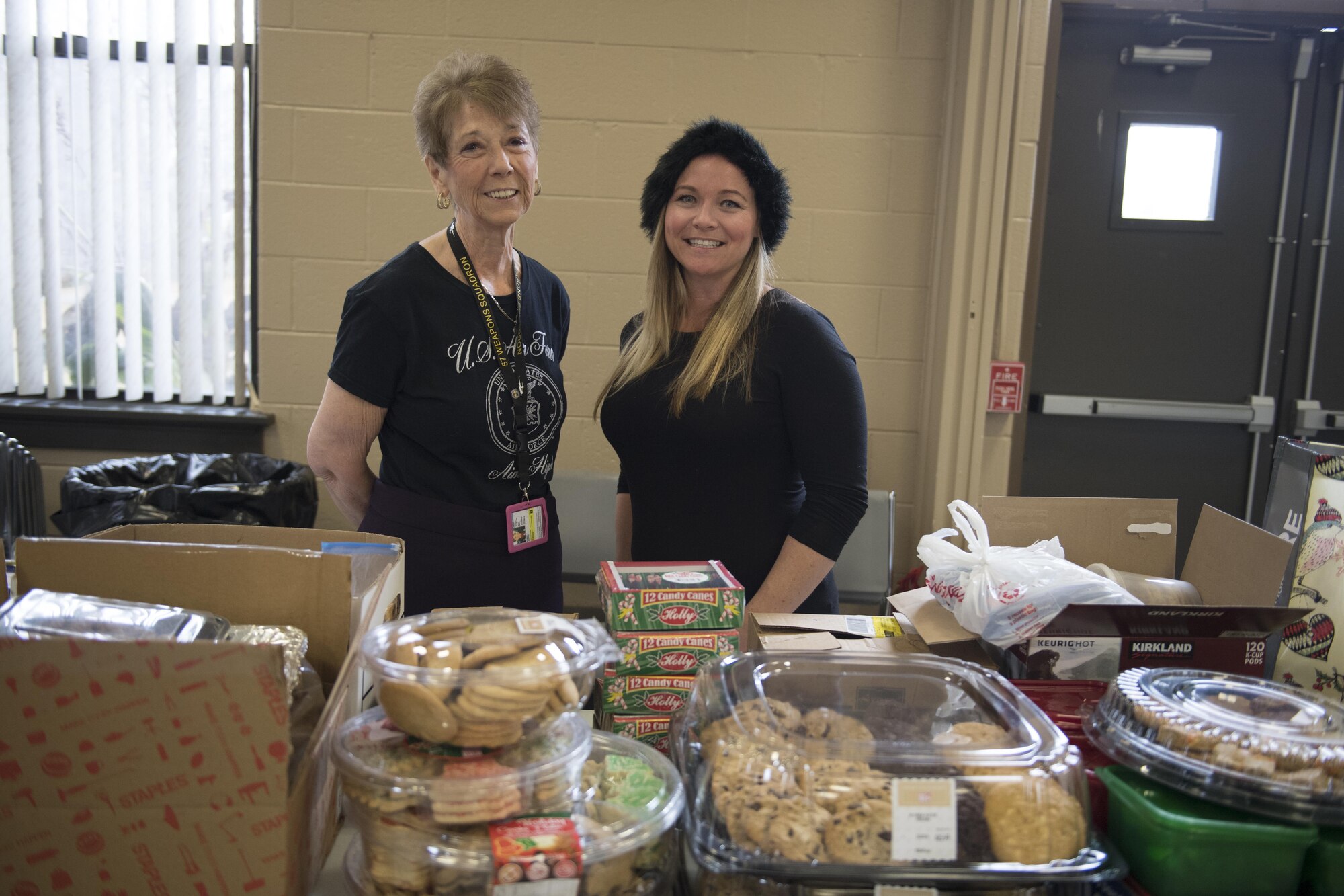 Judith Pakay and Allison Pachasa assemble cookies for the annual cookie drive, a program that delivers donated sweet treats to junior enlisted service members in the dormitories at Joint Base McGuire-Dix-Lakehurst, New Jersey, Dec. 8, 2016. Pakay alone delivered 2,000 cookies to the drive which typically sees the donation of well over 10,000 cookies. 