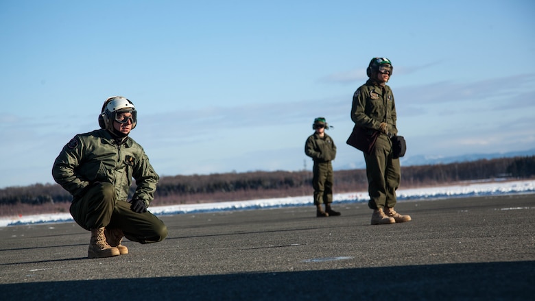 U.S. Marines with Marine Attack Squadron (VMA) 542 conduct preflight inspections during the Aviation Training Relocation Program at Chitose Air Base, Japan, Dec. 8, 2016. During the ATR the Marines with the power line division for VMA-542 have ensured the safety of all aircraft involved through routine flight inspections, launching the aircraft and recovering the aircraft. (U.S. Marine Corps photo by Cpl. James A. Guillory)