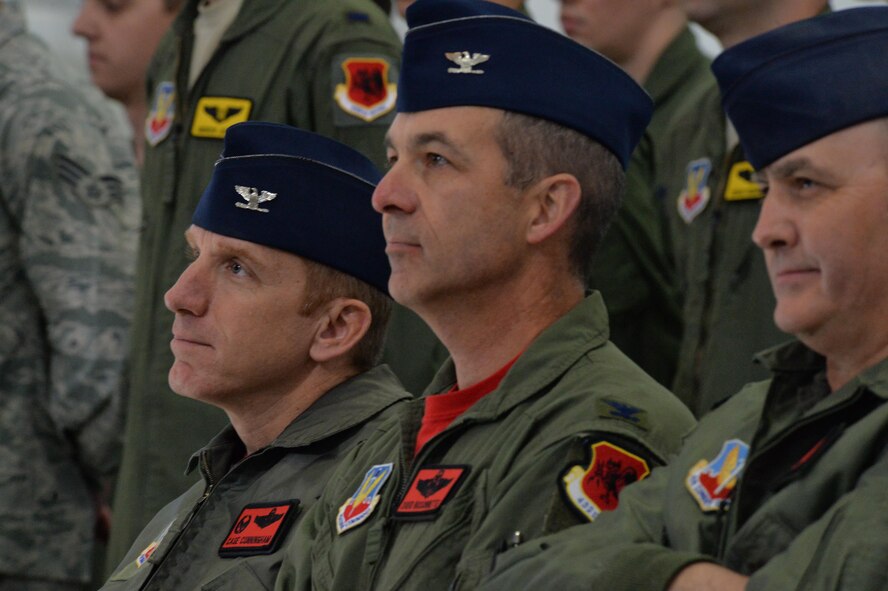 Col. Case Cunningham, 432nd Wing commander, Col. David Bissonnette, 432nd Wing vice commander, and Chief Master Sgt. Greg, 432nd Wing acting command chief, watch the 489th Attack Squadron reactivation ceremony Dec. 2, 2016, at Creech Air Force Base, Nev. The unit will assume responsibility of aircraft launch and recovery in deployed environments, operating on a rotational basis to relieve the deployment cycle for other flying squadrons on base. (U.S. Air Force photo/ Airman 1st Class Kristan Campbell)