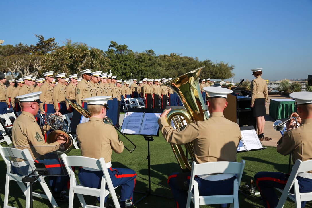 Marine Band San Diego’s brass quintet plays Anchors Aweigh and the Marine’s Hymn during Marine Corps Recruiting Command’s Superior Achiever Ceremony at Naval Base Point Loma, Dec. 8. The Superior Achiever Award was established in 1981 to recognize Marine Corps recruiting stations that achieve or exceed specified recruiting goals each fiscal year.