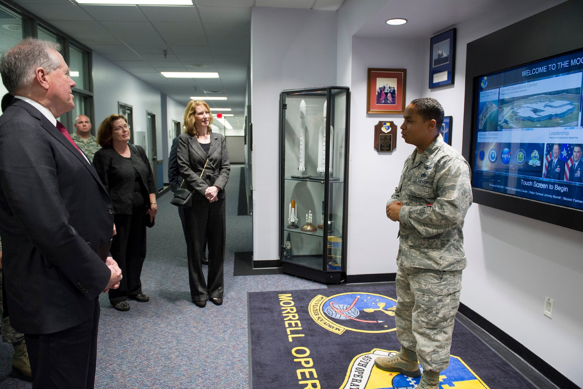 Second Lt. Jose Rosario briefs Under Secretary of Defense for Acquisition, Technology and Logistics Frank Kendall and Under Secretary of the Air Force Lisa S. Disbrow Dec. 7, 2016, at the Morrell Operations Center located on Cape Canaveral Air Force Station, Fla. The MOC is where all range operations take place to monitor the Eastern Range during launches.
