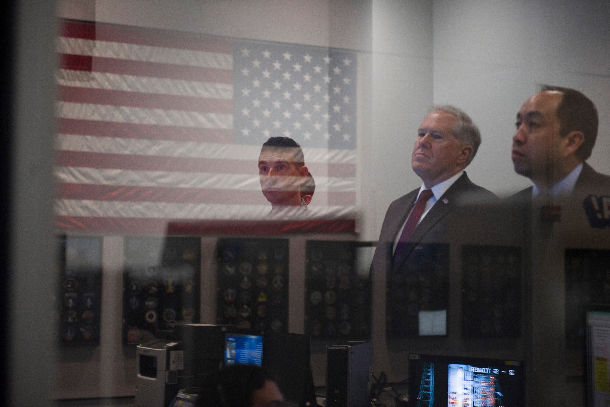 Col. Burton Catledge, 45th Operations Group commander, and Under Secretary of Defense for Acquisition, Technology and Logistics Frank Kendall watch pre-launch operations Dec. 7, 2016, from Cape Canaveral Air Force Station, Fla. The range operations crew prepared for the WGS-8 launch by running tests and exercises to validate crew and equipment readiness. 
