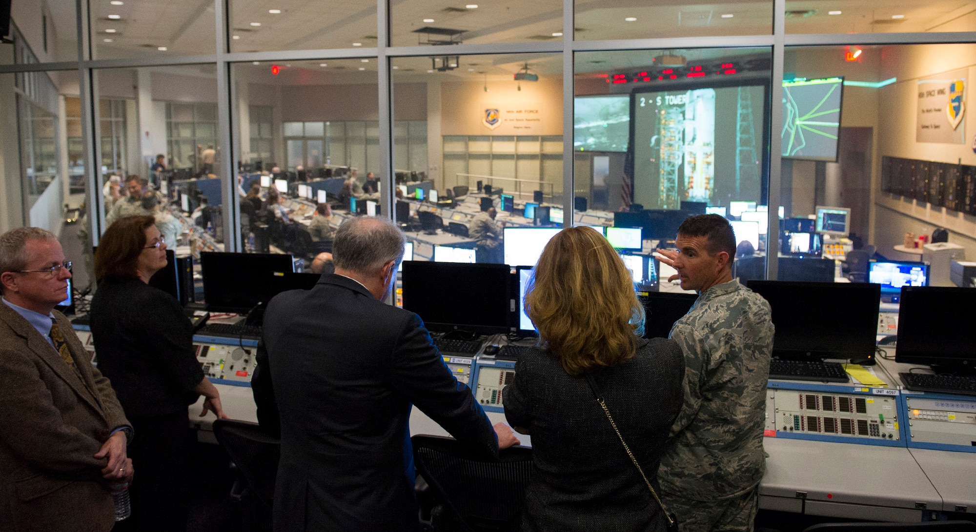 Col. Burton Catledge, 45th Operations Group commander, explains how each Airmen contributes to the 45th Space Wing mission in the Mission Control Room Dec. 7, 2016, on Cape Canaveral Air Force Station, Fla. The 45th Space
Wing Airmen provide the activities and resources for safety of flight, range instrumentation, infrastructure, and scheduling required to support every launch. 
