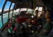 Aircrew aboard a C-130 Hercules assigned to the 36th Airlift Squadron circle a Micronesian Island Dec. 5, 2016. The crew was practicing airdrop procedures during Operation Christmas Drop. Each year Operation Christmas Drop provides aid to over 30,000 islanders in the Pacific. (U.S. Air Force photo/Senior Airman Elizabeth Baker)