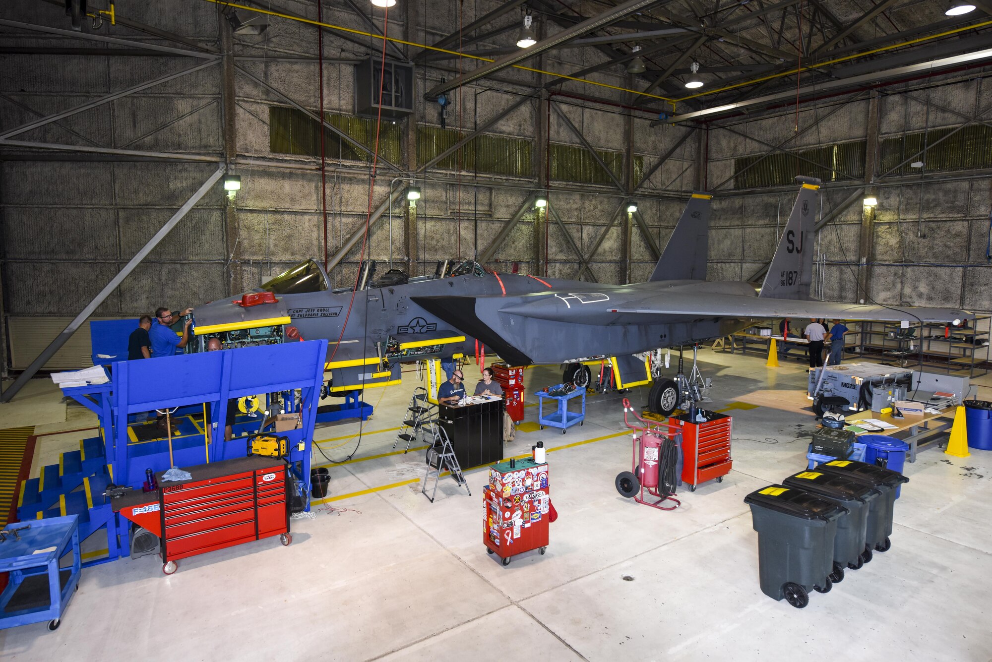 An F-15E Strike Eagle from the 336th Fighter Squadron sits in a hanger while members of the Radar Modernization Program Eagle modernization program team begin removing panels, Oct. 3, 2016, at Seymour Johnson Air Force Base, North Carolina. More than 90 jets at Seymour Johnson AFB will receive the radar modifications, projected to be completed in seven to nine years. (U.S. Air Force photo by Airman Shawna L. Keyes)