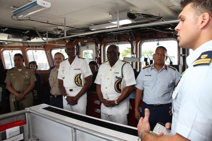 Coast Guard Lt. David Gilbert, commanding officer of the fast response cutter USCGC Richard Dixon, briefs chiefs of defense and public security ministers attending the 15th Caribbean Nations Security Conference in San Juan, Puerto Rico, Dec. 7, 2016. Conferees examined trends, challenges and threats impacting stability in the Caribbean and defined a collective strategy to improve their forces’ collaboration in support of regional security. Southcom photo by Jose Ruiz