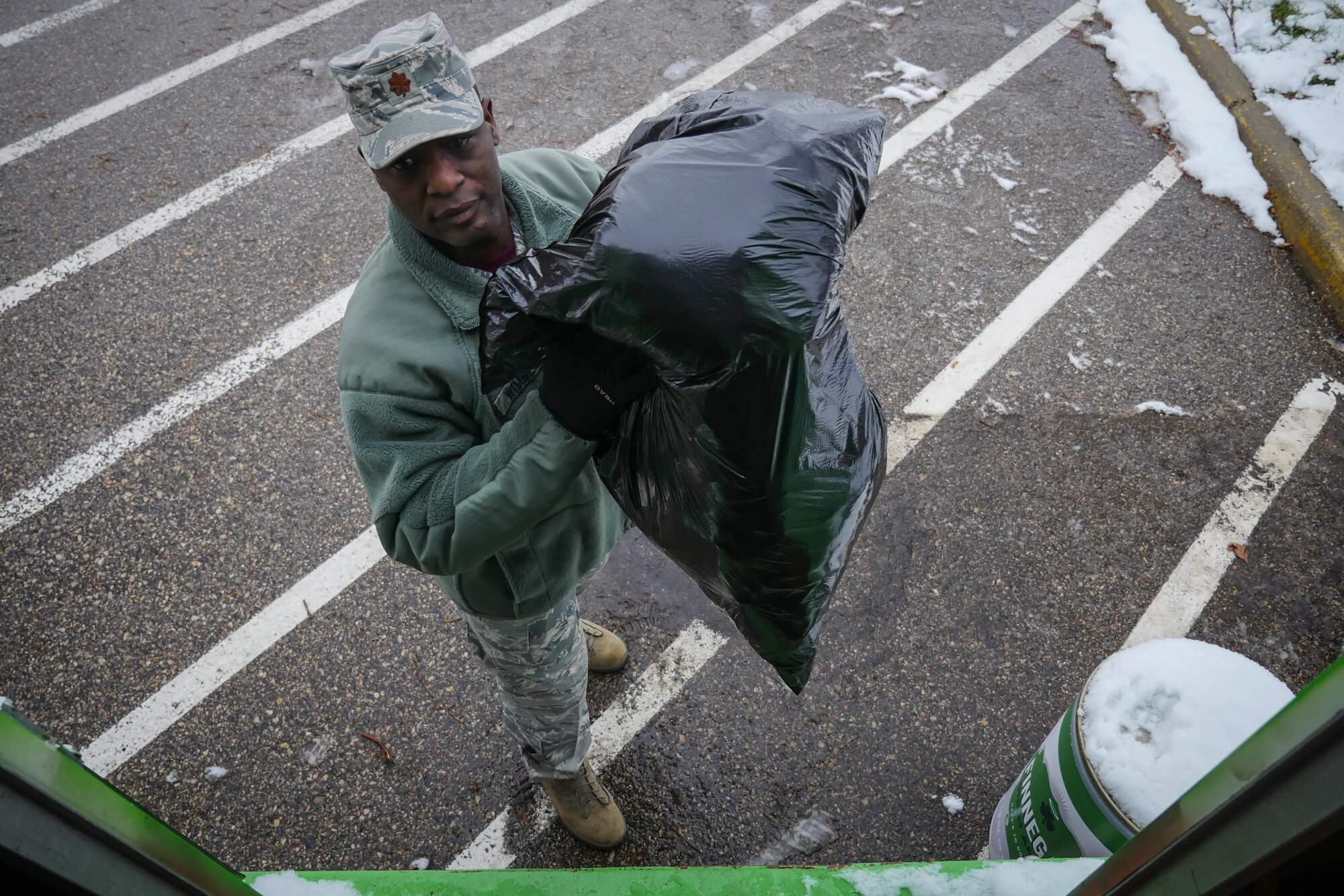 Maj. John Wimbley, 934th Aeromedical Staging Squadron, loads a truck with donated winter clothing during the December Unit Training Assembly at the Minneapolis-St. Paul Air Reserve Station, Minn. The donated clothing will go to homeless veterans around the city. (U.S. Air Force photo by Staff Sgt. Corban D. Lundborg/Released)