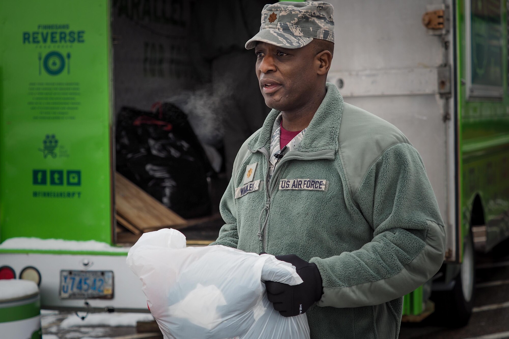 Maj. John Wimbley, 934th Aeromedical Staging Squadron, loads a truck with donated winter clothing during the December Unit Training Assembly at the Minneapolis-St. Paul Air Reserve Station, Minn. The donated clothing will go to homeless veterans around the city. (U.S. Air Force photo by Staff Sgt. Corban D. Lundborg/Released)


