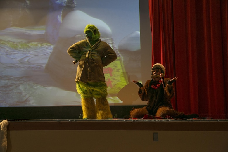 Creating Arts Company’s cast performs “How the Grinch Stole Christmas” during the Combat Center Holiday Show at Sunset Cinema aboard Marine Corps Air Ground Combat Center, Twentynine Palms, Calif., Nov. 3, 2016. (Official Marine Corps photo by Lance Cpl. Dave Flores/Released)