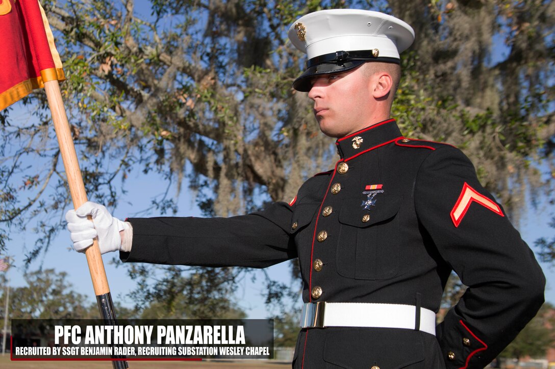 Private First Class Anthony C. Panzarella stands at parade rest before marching onto the parade deck during recruit graduation Dec. 9, 2016, aboard Marine Corps Recruit Depot, Parris Island, South Carolina. Panzarella is the honor graduate of platoon 3098 and was recruited by Staff Sgt. Benjamin J. Rader from Wesley Chapel, Florida. (Official Marine Corps photo by Cpl. Diamond N. Peden/Released)
