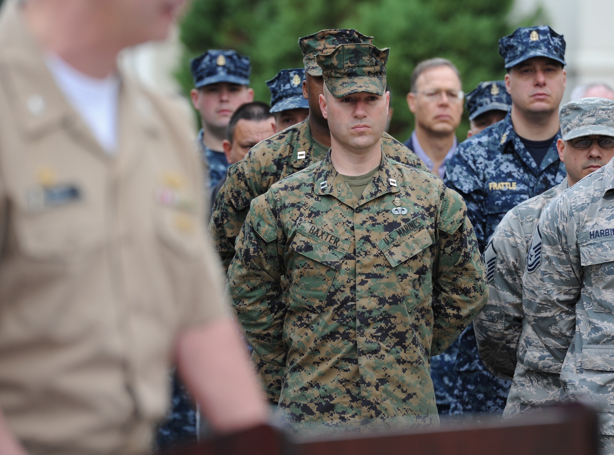 U.S. Marine Corps Capt. Gary Baxter, Keesler Marine Detachment commanding officer, attends a Center for Naval Aviation Technical Training Unit Keesler Pearl Harbor 75th Anniversary Remembrance Ceremony in front of Allee Hall Dec. 7, 2016, on Keesler Air Force Base, Miss. More than 100 Keesler personnel attended the event to honor those lost in the Dec. 7, 1941 Pearl Harbor attacks. (U.S. Air Force photo by Kemberly Groue)