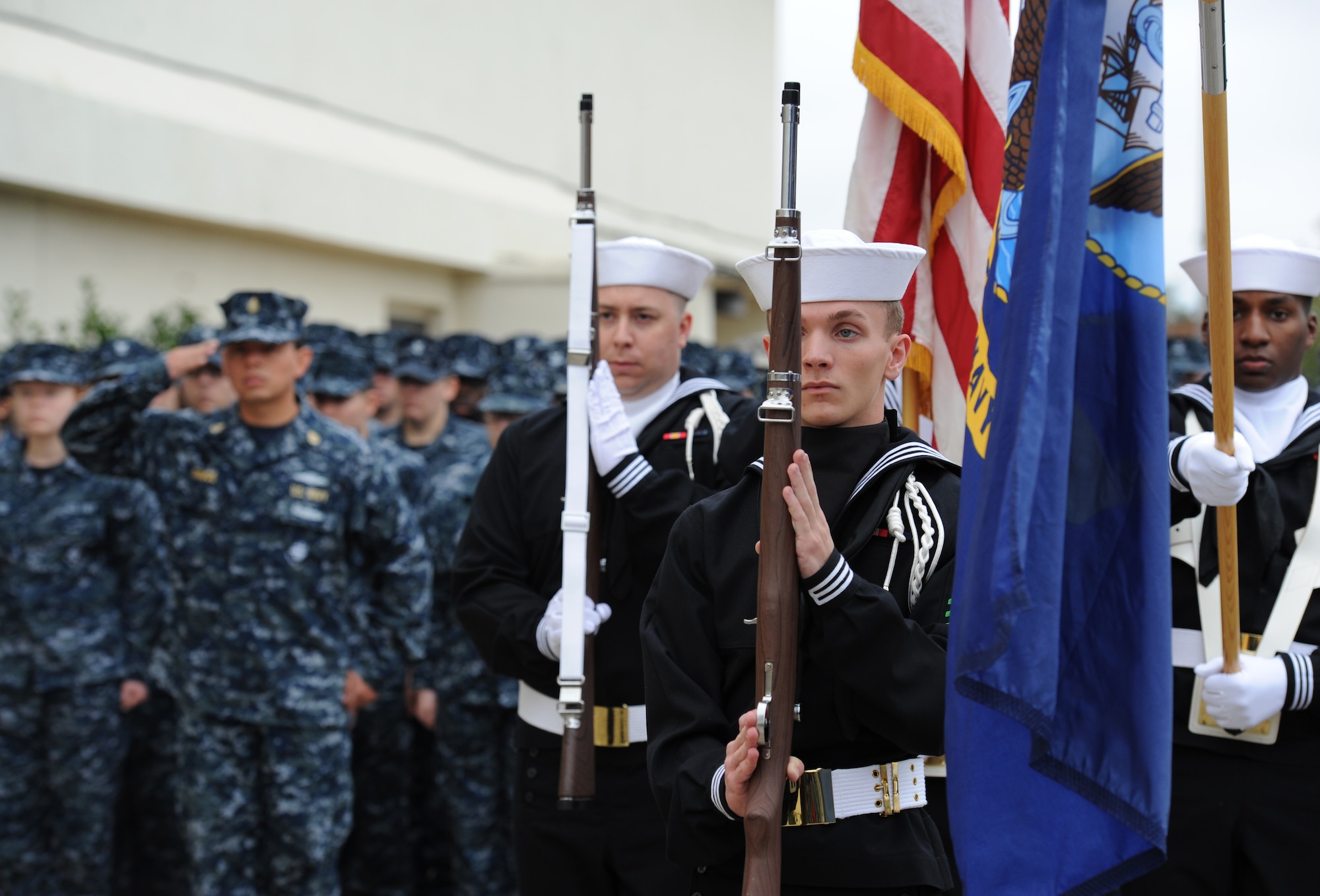 Center for Naval Aviation Technical Training Unit Keesler Honor Guard members post the colors during a CNATTU Keesler Pearl Harbor 75th Anniversary Remembrance Ceremony in front of Allee Hall Dec. 7, 2016, on Keesler Air Force Base, Miss. More than 100 Keesler personnel attended the event to honor those lost in the Dec. 7, 1941 Pearl Harbor attacks. (U.S. Air Force photo by Kemberly Groue)