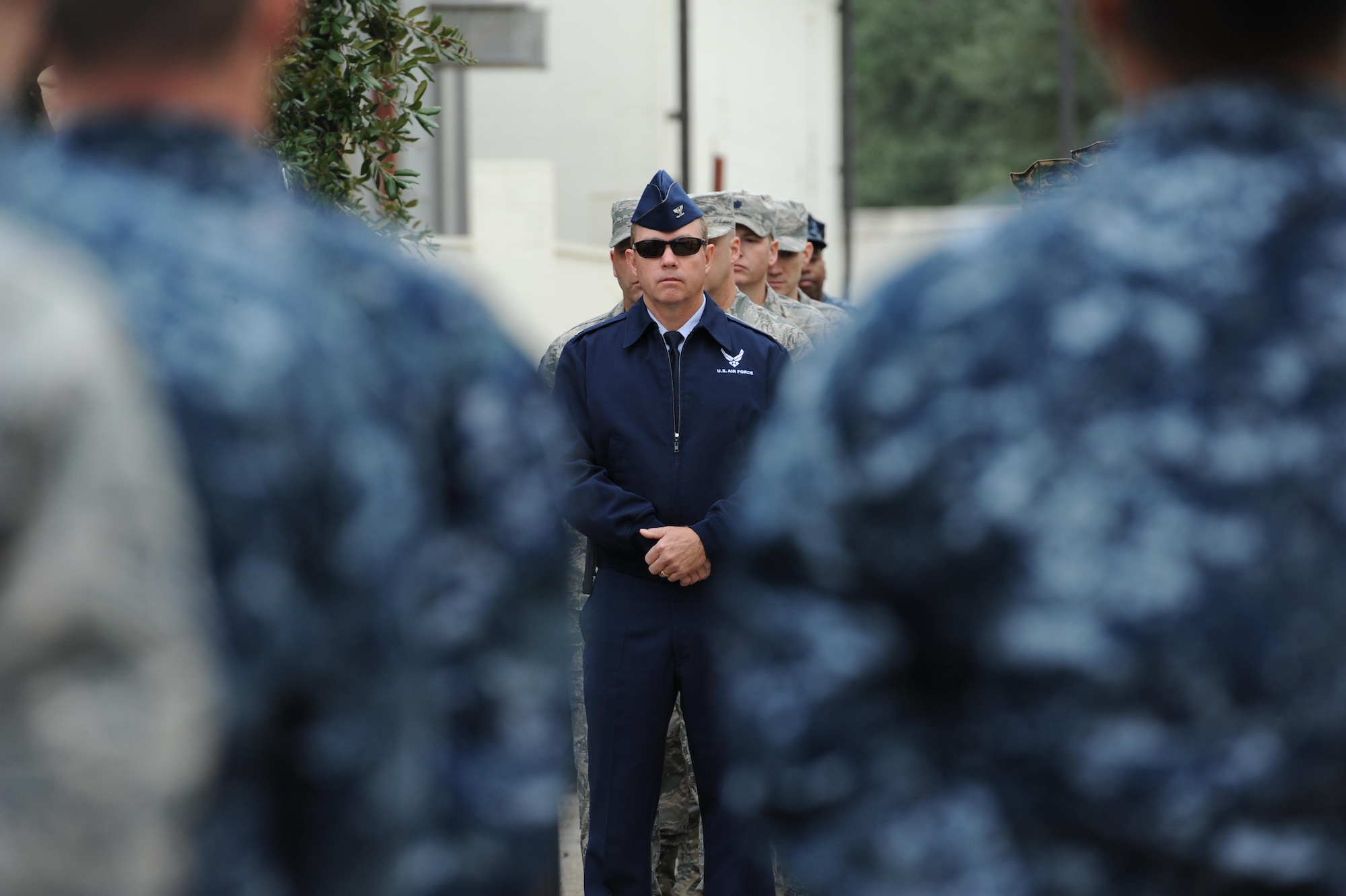 U.S. Air Force Col. Scott Solomon, 81st Training Group commander, attends a Center for Naval Aviation Technical Training Unit Keesler Pearl Harbor 75th Anniversary Remembrance Ceremony in front of Allee Hall Dec. 7, 2016, on Keesler Air Force Base, Miss. More than 100 Keesler personnel attended the event to honor those lost in the Dec. 7, 1941 Pearl Harbor attacks. (U.S. Air Force photo by Kemberly Groue)