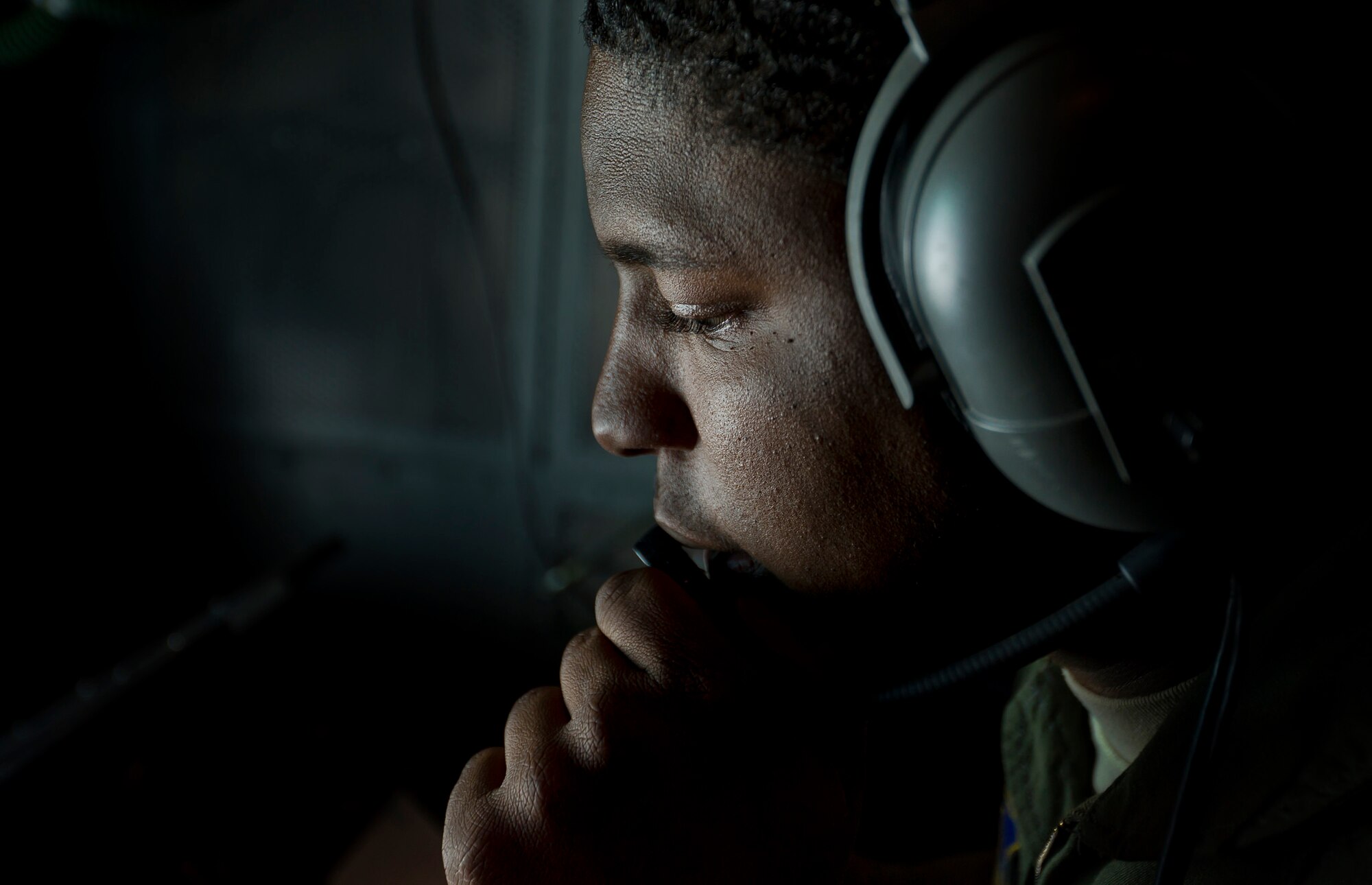 SSgt Silvio NG III, 78th Air Refueling Squadron boom operator, counts down the feet between the nozzle of the boom and a KC-10 Extender's fuel receptacle during an aerial refueling training flight Dec. 8 here. 