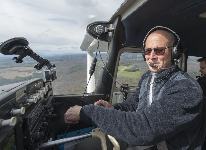 Retired Col. Pete Mapes, a pilot-physician, demonstrates a ground collision avoidance system he installed on his Cessna aircraft during a flight over Maryland, April 7, 2016. Mapes was instrumental to the employment the Automatic  Ground Collision Avoidance System in F-16 fighter jets across the Air Force. (U.S. Air Force photo/Master Sgt. Brian Ferguson)
