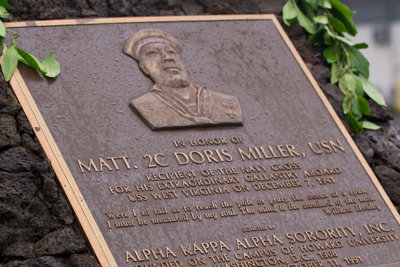 The plaque honoring Navy Mess Attendant Second Class Doris "Dorie" Miller is seen, Honolulu, Hawaii, Dec. 8, 2016. DoD photo by Lisa Ferdinando
