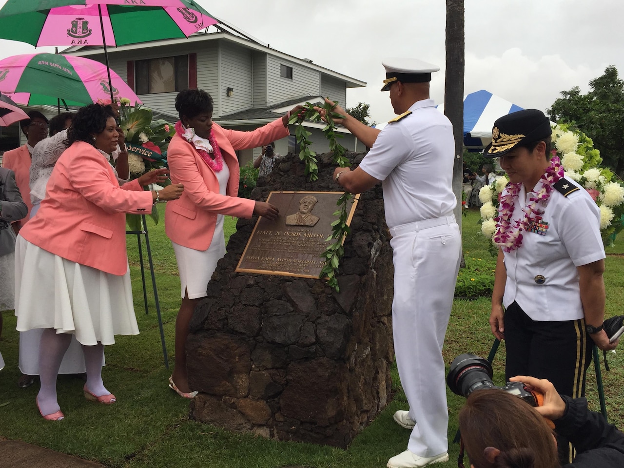 Navy Rear Adm. John Fuller, the commander of Navy Region Hawaii, and of Naval Surface Group, Middle Pacific, takes part in the ceremony to rededicate a plaque in honor of Navy Mess Attendant Second Class Doris "Dorie" Miller, Honolulu, Hawaii, Dec. 8, 2016. DoD photo by Lisa Ferdinando