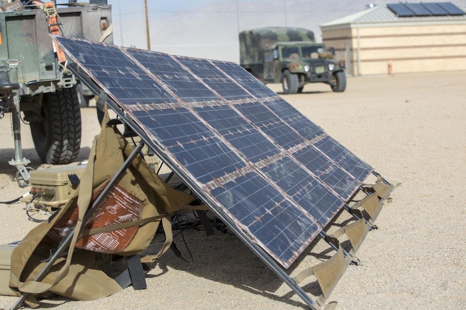 Marines with 3rd Battalion, 11th Marine Regiment, display the Ground Renewable Expeditionary Electronics Network System during the Energy Capability Exercise, in alignment with the Great Green Fleet initiative, at Camp Wilson aboard the Marine Corps Air Ground Combat Center, Twentynine Palms, Calif., Dec. 6, 2016. (Official Marine Corps photo by Cpl. Levi Schultz/Released)
