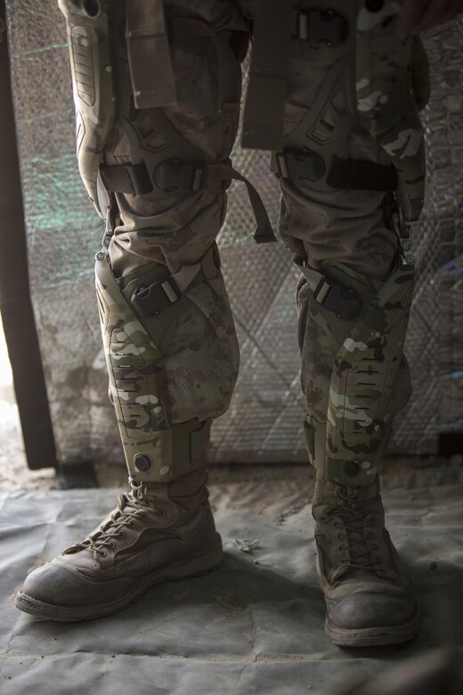 A Marine with 3rd Battalion, 11th Marine Regiment wears Kinetic Energy Harvesters, developed by Bionic Power, during the Energy Capability Exercise, in alignment with the Great Green Fleet initiative, at Camp Wilson aboard the Marine Corps Air Ground Combat Center, Twentynine Palms, Calif., Dec. 6, 2016. (Official Marine Corps photo by Cpl. Levi Schultz/Released)