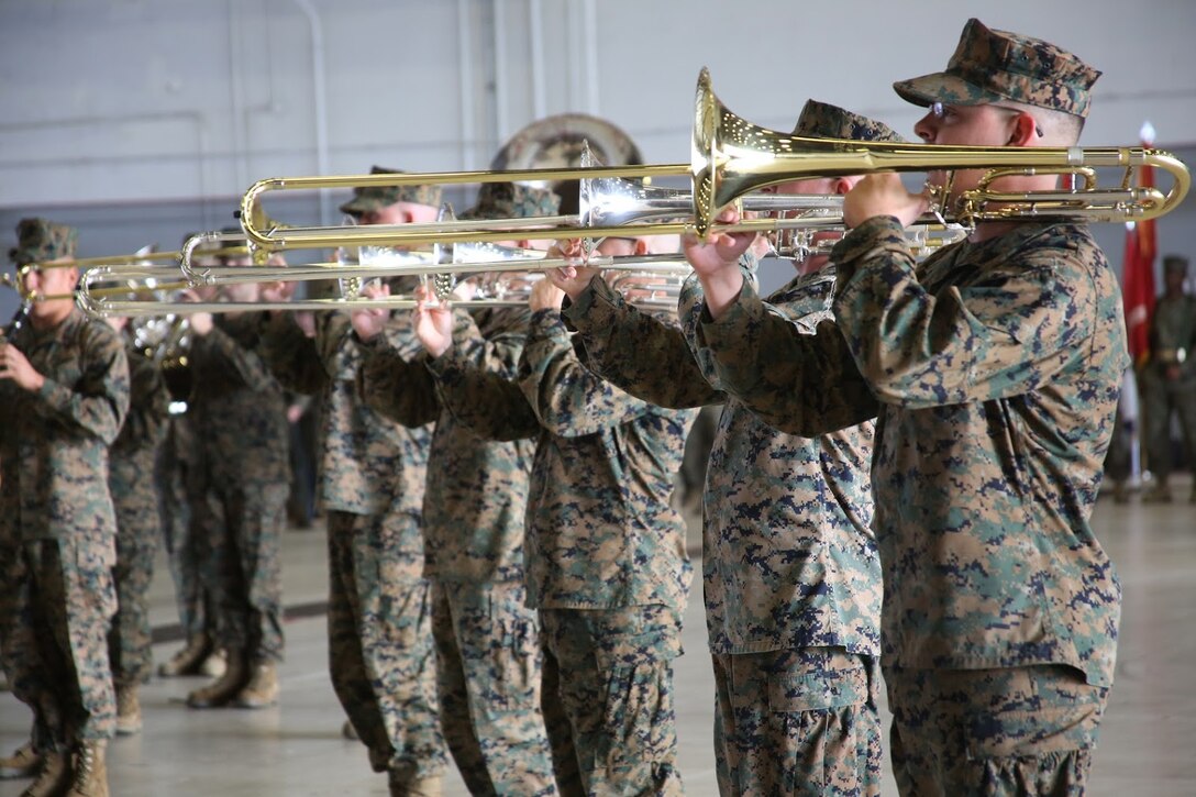 Members of the 2nd Marine Aircraft Wing band perform during a relief and appointment ceremony Dec. 8, 2016. During the ceremony Sgt. Maj. Richard Thresher relinquished his post as the sergeant major of 2nd Marine Aircraft Wing to Sgt. Maj. Howard Kreamer. Kreamer was the sergeant major of 2nd Marine Expeditionary Brigade, and Thresher’s next assignment is sergeant major of II Marine Expeditionary Force. (U.S. Marine Corps photo by Lance Cpl. Mackenzie Gibson/Released)