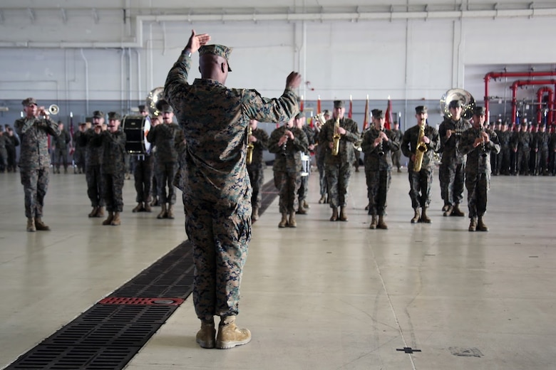 Members of the 2nd Marine Aircraft Wing band perform during a relief and appointment ceremony aboard Marine Corps Air Station Cherry Point, N.C., Dec. 8, 2016. During the ceremony Sgt. Maj. Richard Thresher relinquished his post as the sergeant major of 2nd Marine Aircraft Wing to Sgt. Maj. Howard Kreamer. Kreamer was the sergeant major of 2nd Marine Expeditionary Brigade, and Thresher’s next assignment is sergeant major of II Marine Expeditionary Force.  (U.S. Marine Corps photo by Lance Cpl. Mackenzie Gibson/Released)