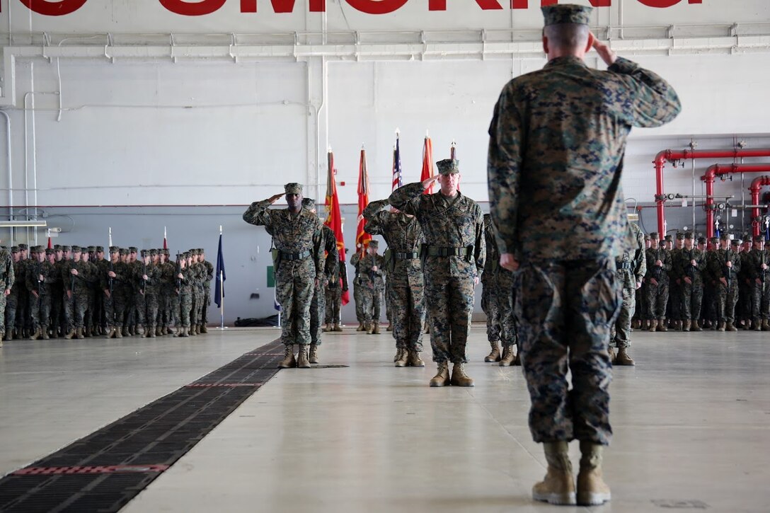 Brig. Gen. Matthew Glavy salutes the troops formed during a relief and appointment ceremony aboard Marine Corps Air Station Cherry Point, N.C., Dec. 8, 2016. Sgt. Maj. Howard Kreamer was appointed as the sergeant major of 2nd Marine Aircraft Wing during the ceremony. Sgt. Maj. Richard Thresher’s next assignment is sergeant major of II Marine Expeditionary Force.  Glavy is the commanding general of 2nd MAW. (U.S. Marine Corps photo by Lance Cpl. Mackenzie Gibson/Released)