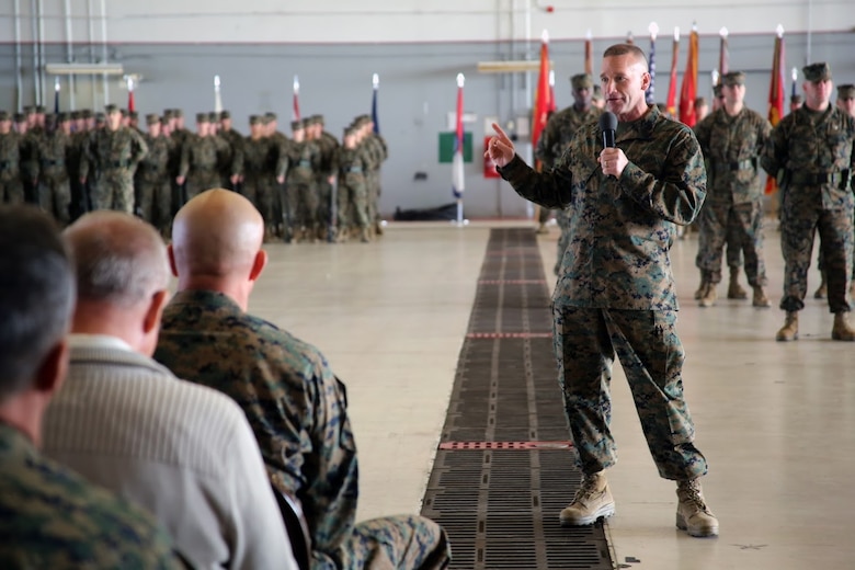 Sgt. Maj. Richard Thresher speaks to the crowd during a relief and appointment ceremony aboard Marine Corps Air Station Cherry Point, N.C., Dec. 8, 2016. Sgt. Maj. Howard Kreamer, previously the sergeant major of 2nd Marine Expeditionary Brigade, was appointed the new sergeant major of 2nd Marine Aircraft Wing. Thresher’s next assignment is sergeant major of II Marine Expeditionary Force. (U.S. Marine Corps photo by Lance Cpl. Mackenzie Gibson/Released)