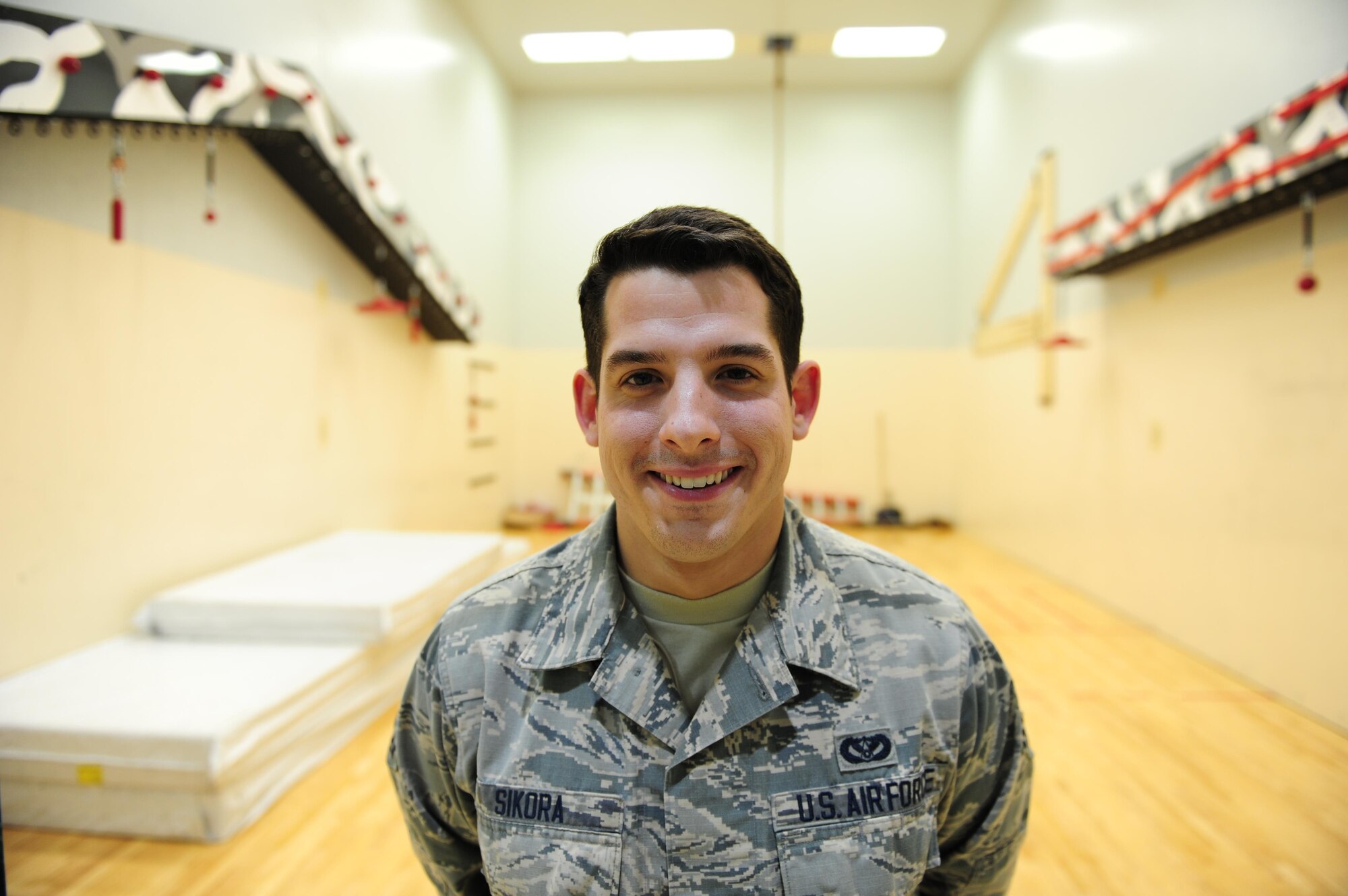 U.S. Air Force Senior Airman Johnathan Sikora, a 354th Civil Engineer Squadron structural journeyman, takes a brief break Dec. 6, 2016, at the Baker Field House on Eielson Air Force Base, Alaska. Sikora says every day he tries to better himself and nobody should cap their potential in life. (U.S. Air Force photo by Airman Isaac Johnson)