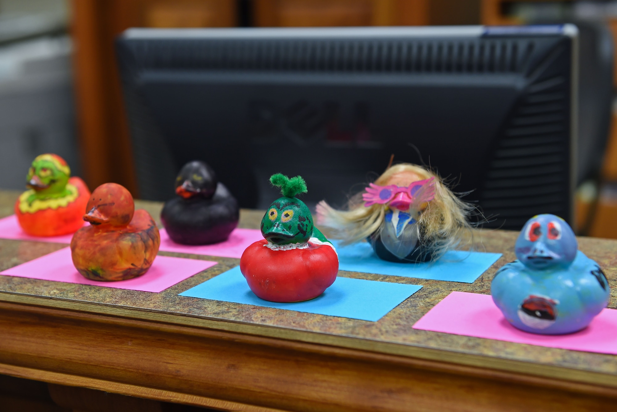 Adults and children decorated rubber ducks for display as part of the Duck the Halls competition from Nov. 28 to Dec. 9, at the Joint Base Elmendorf-Richardson Library. Artists of all ages and experience were given the opportunity to bring their favorite book characters to life. Voting on the top three ducks will begin on Dec. 12. 