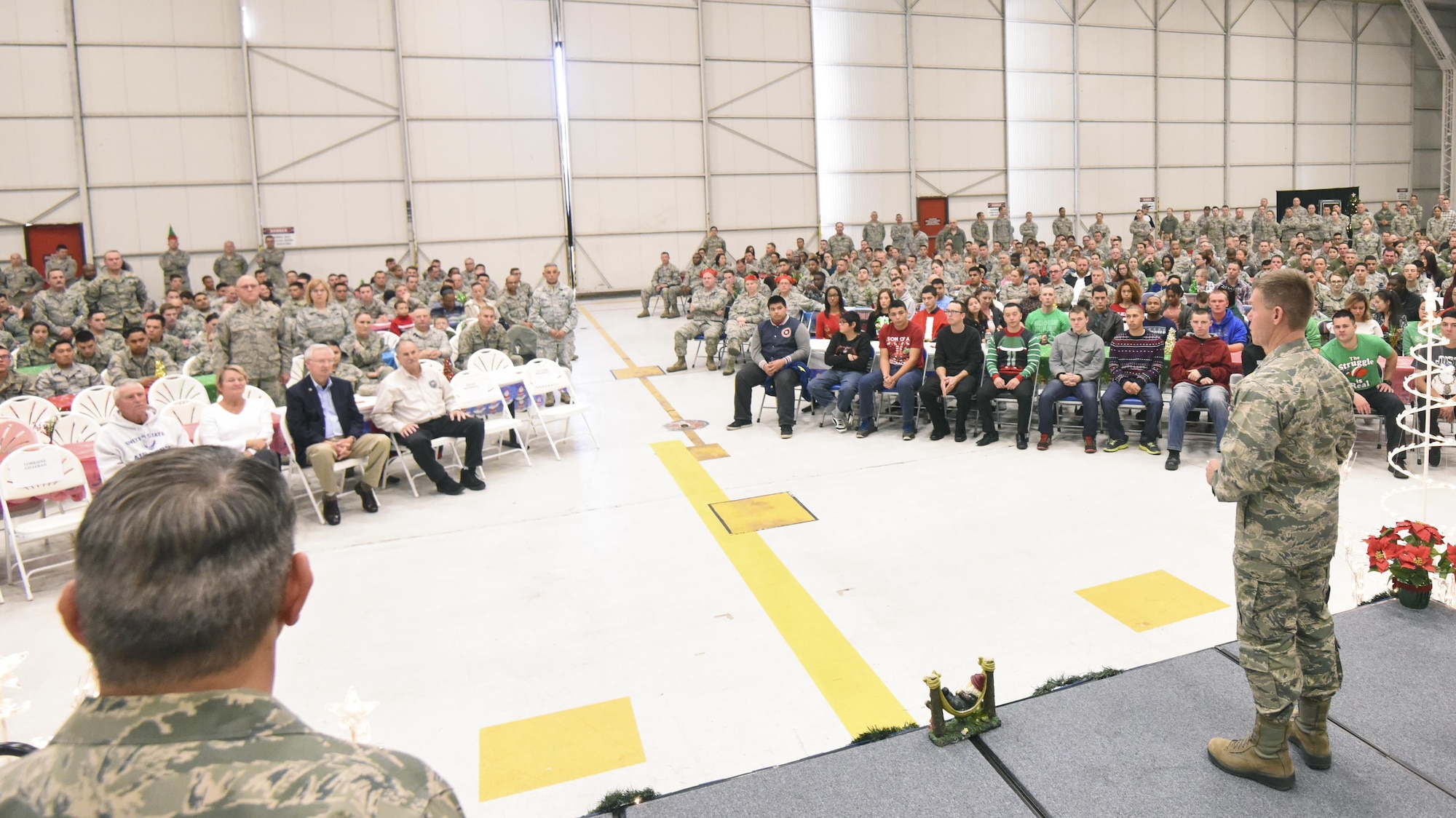 Col. Craig C. Peters, 940th Air Refueling Wing commander, speaks to wing during his commander’s call Dec. 3, 2016, at Beale Air Force Base, California. The commander focused his message on support for the Airmen who will be deploying in the upcoming months and their families. (Air Force Photo by Staff Sgt. Brenda Davis)