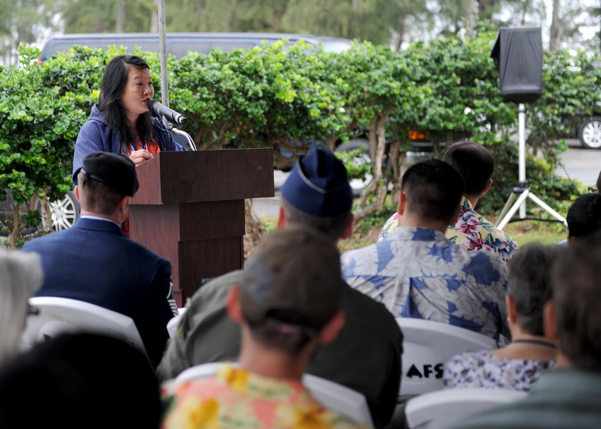 Jessie Higa, a volunteer historian and event organizer, gives keynote remarks during a ceremony commemorating servicemembers honored for their bravery during the Dec. 7th attack on Pearl Harbor and Oahu at Bellows Air Force Station, Hawaii, Dec. 8th, 2016. Approximately 100 people, including family members of several honored veterans, came together in recognizing the bravery displayed on the day of the attacks. (U.S. Air Force photo by Staff Sgt. Alexander Martinez)