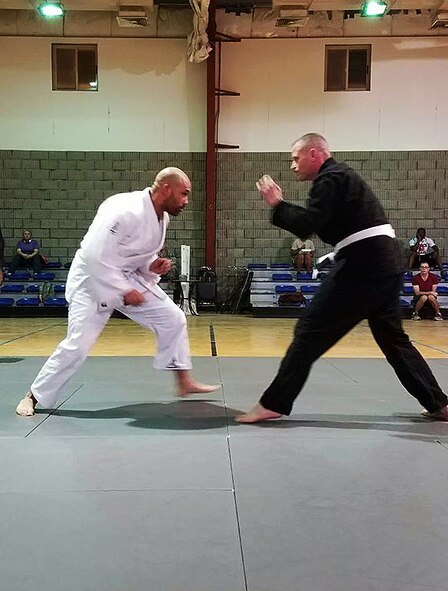 Base personnel fill the starting line of a 5K race commemorating the 75th anniversary of the attack on Pearl Harbor at Al Udeid Air Base, Qatar, Dec. 7, 2016. Participants used the anniversary as an opportunity to come together and honor the sacrifice and dedication of those who perished and those who survived the attack, both civilian and military. (Courtesy Photo)